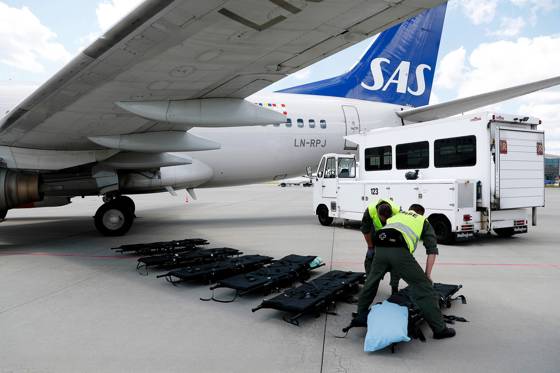 Picture of an aircraft with medical personnel.