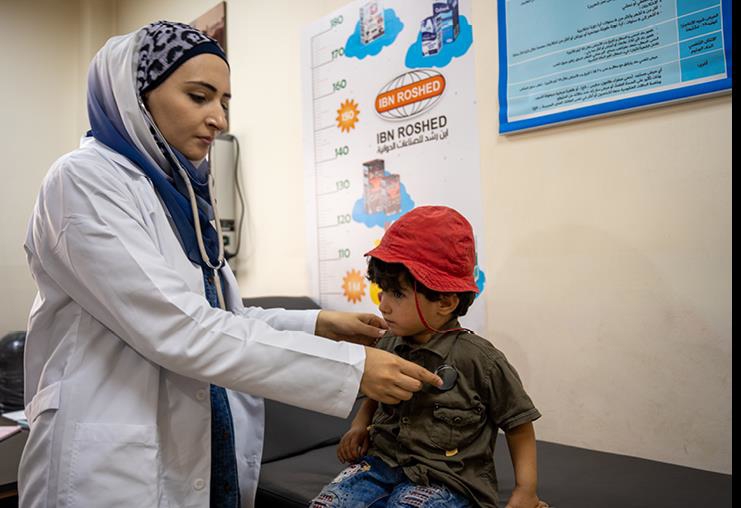 Jana (2 years old) has come to the health clinic to receive help. She has kidney stones. Sahkour Health Clinic in Aleppo, Syria. The Norwegian Red Cross supports this clinic, and the influx of patients is constantly increasing.