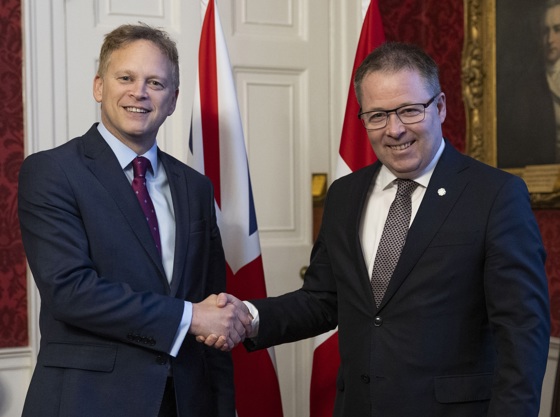 Image of the Secretary of State for Defence Grant Shapps (left), seen here shaking hands with the Norwegian Defence minister, Bjørn Arild Gram at a trilateral agreement between the UK, Norway, and Ukraine Dec. 11 2023.