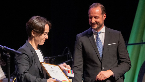 His Royal Highness Crown Prince Haakon and award winner Olena Shevchenko on stage in the Norwegian Opera House.